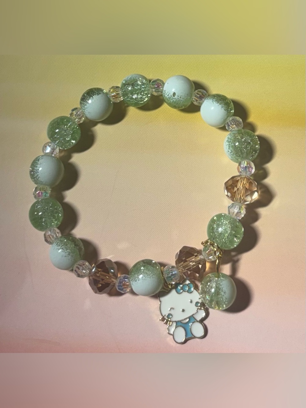 Hello Kitty Green and White Beaded Stretch Bracelet with Enamel Charm